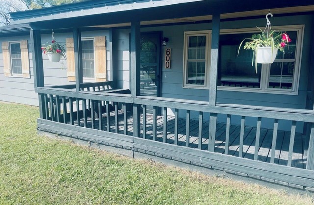 Snuggle up and relax with the whole family at this Ava home.