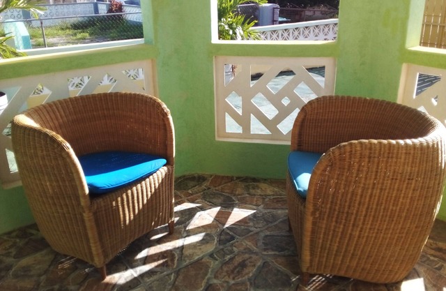 SOUTH SIDE.Quaint and attractivenQuiet and breezy patio. n