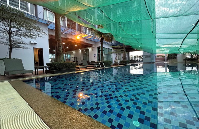 Spacious 2-bedroom condo in welcoming Bangkok with WiFi, AC, fitness room