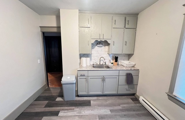 Spacious 4-bedroom apartment in cool Rochester with AC, WiFi, and Onsite Laundry