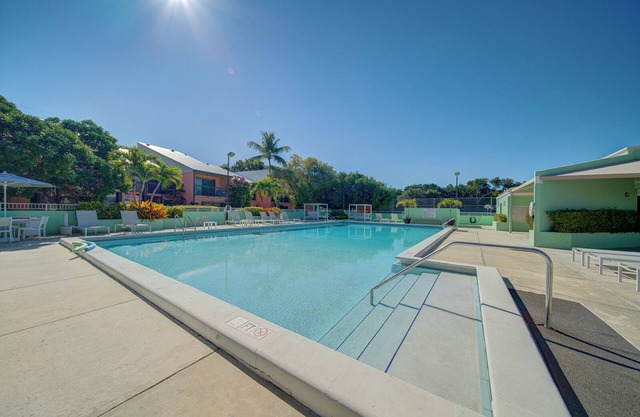 Spacious 4-bedroom Key Largo Villa steps from the pool, pickleball, & marina.