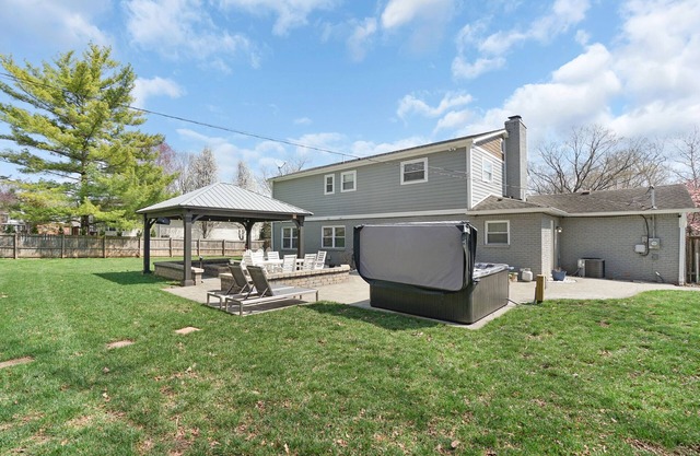 Spacious 5-bedroom house in delightful Indianapolis wit hot tub and gameroom!