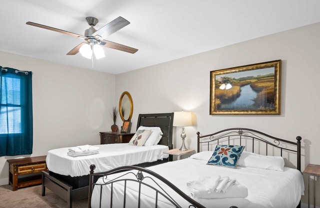 Spacious 6BR Near Ark! Ample Parking, 3 Full Baths