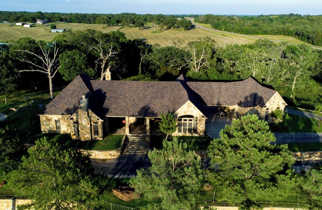 Spacious home located on 76 acres nestled on a pond.