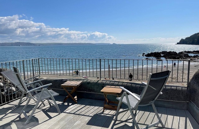 Spacious light cosy beach front house with balcony overlooking the sea