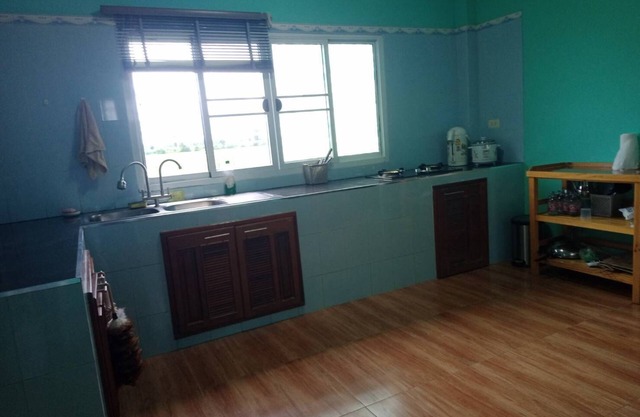 Spacious riverside off-grid 4-bedroom house with AC, Wifi