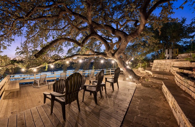 SPECTACULAR LAKEFRONT OASISnOver 400 feet frontage on 2 acres of century oaks
