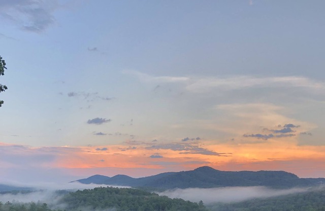 Spectacular view of a gorgeous mountain valley and golf course awaits you