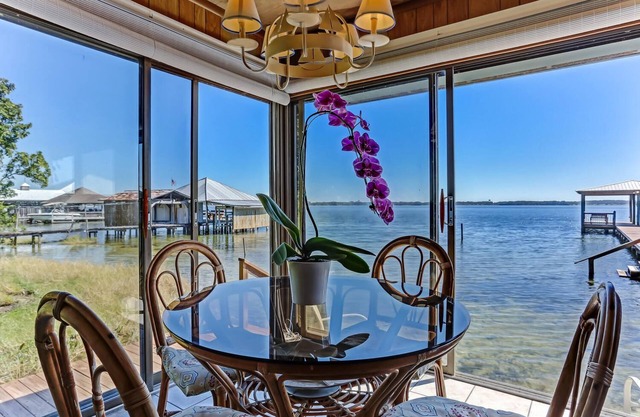 Spectacular Views On A Pristine Lake, Home sits at the waters edge for best view