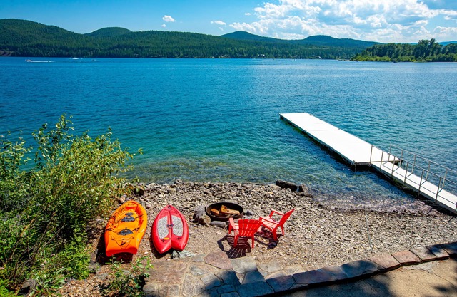 Spectacular Whitefish Lakefront home! Private dock, paddle boards, kayak and incredible views