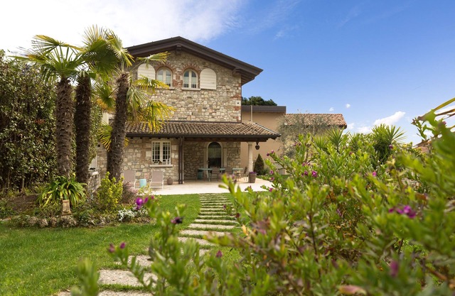 Splendid restored design villa with lake view