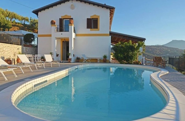 Splendid Villa Set on a Hillside Above the Beach