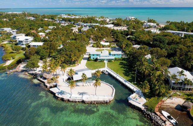 Sprawling Bayfront Estate in Heart of Islamorada with Dockage, Beach, Pool, Kayaks, Bikes and More!