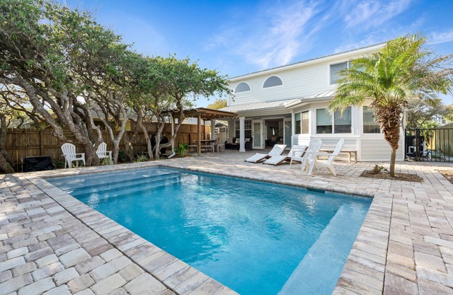 Steps to the beach, heated pool with guest house and courtyard
