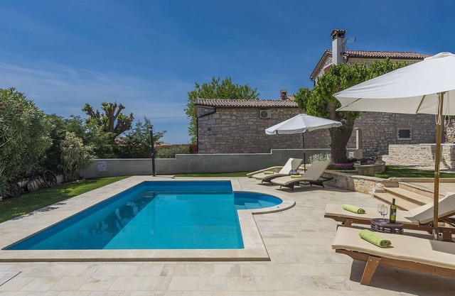 Stone holiday home with private pool and fenced garden near the water park