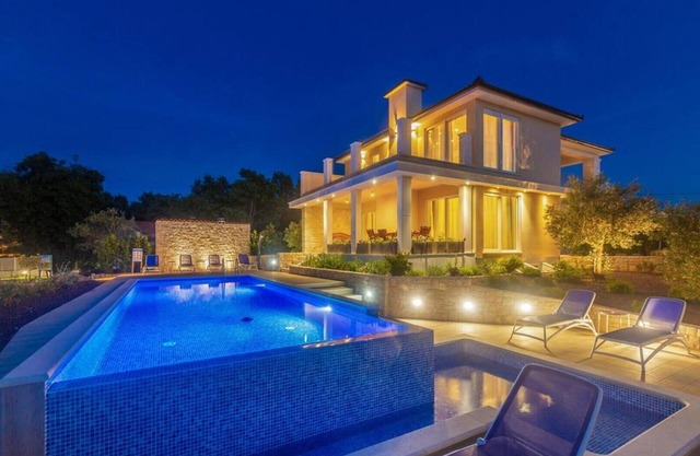 Stone house Villa Roko* with a sea view and an outdoor pool on Krk