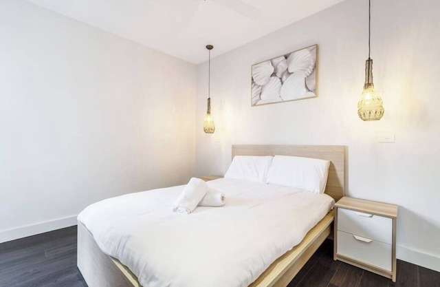 Stroll to the beach + Indoor Parking!