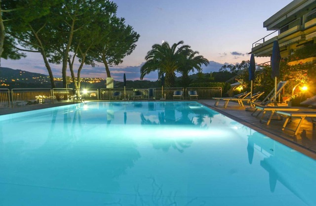 Studio 4 with sea view pool in a panoramic position above the village of Porto Azzurro