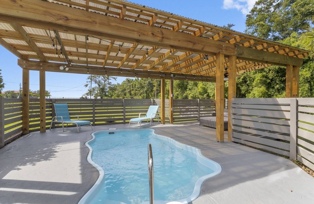 Stunning Custom Home. Walk to the Beach. Heated POOL! Elevator!