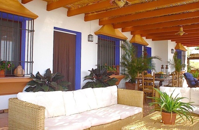 Stylish Andalusian country house with pool in olive grove facing the sea