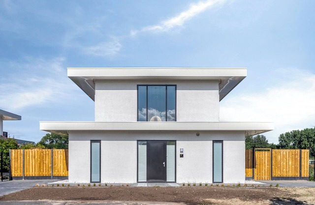 Stylish detached 6-person villa with private sauna, three en-suite bathrooms and private dock on the water