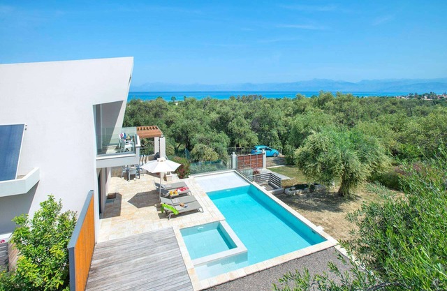 Stylish Modern Villa, A/C, Private Pool & Fabulous Sea Views 15mins walk to Acharavi or Roda Beach!