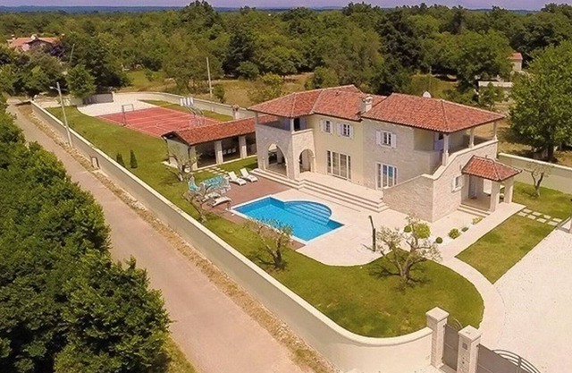 Stylish Villa ***** with heated swimming pool, summer kitchen and sports ground