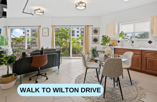 Suite 203: King Bed, Balcony water views, pool