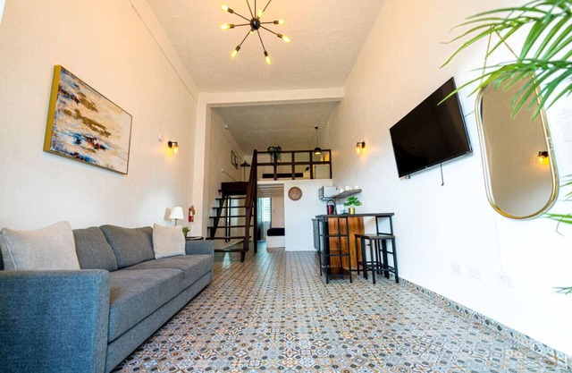 Sunny Escape with Balcony Steps to Dining