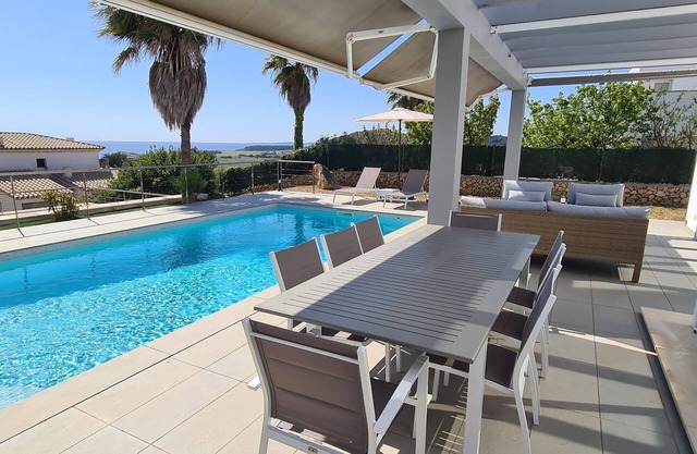 Superb modern villa with swimming pool. Magnificent views of Son Bou beach. Beaches on foot