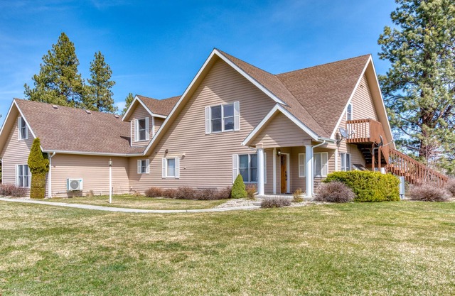 Tastefully Remodeled Mountain View home with trout stream out the back yard.