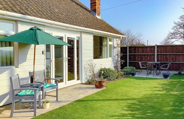 The beach backed by sand dunes is just a short walk away.