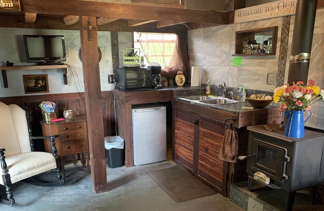 The Guest cottage on the pond holds the country charm.