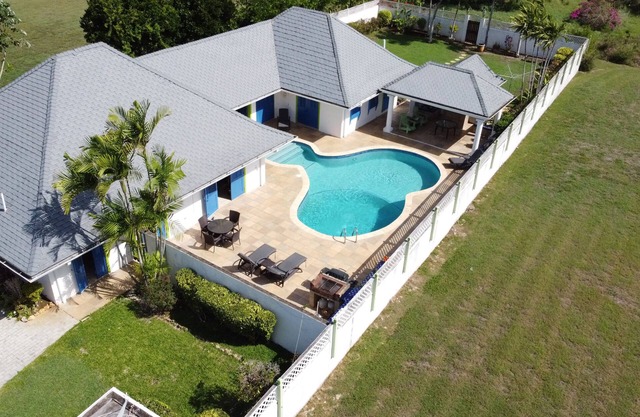 The Heart Villa in Samaan Grove your paradise with a unique heart-shaped pool.
