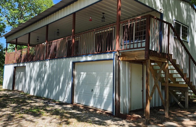 The home is lakefront, perfect! From the roadside, it's nearly impossible to see