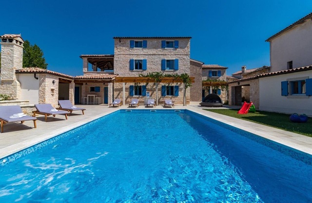 The spacious and beautiful villa with private pool and large yard with the garden