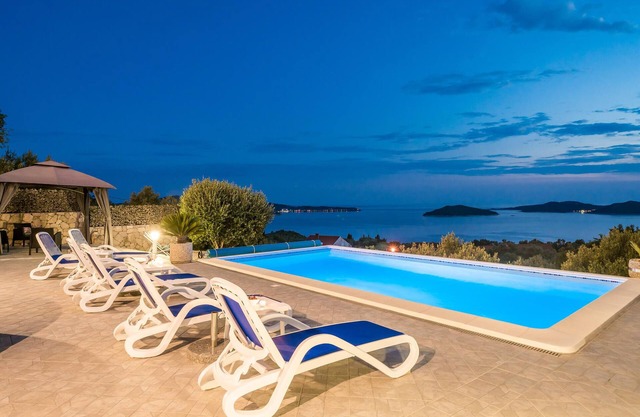 This beautiful stone house consists of three units connected by external stairs.