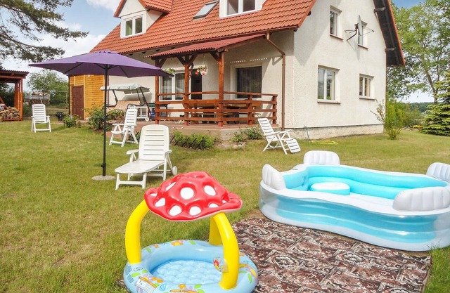 This large cottage is located on an undisturbed property by the pine forest.