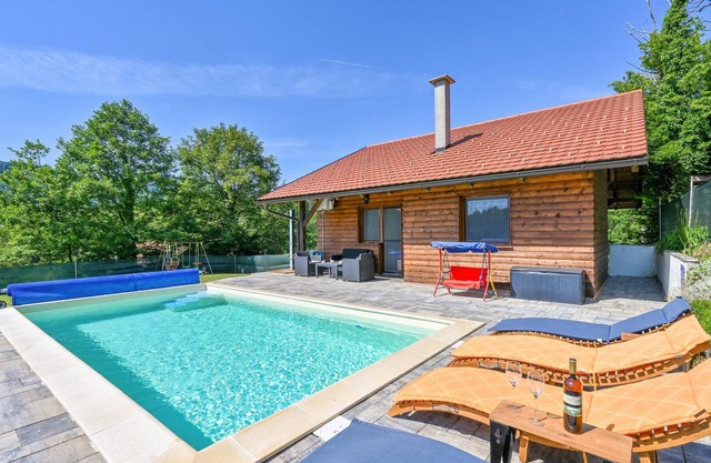 This vacation home with pool is located on a hill with a beautiful view of the countryside, which wi