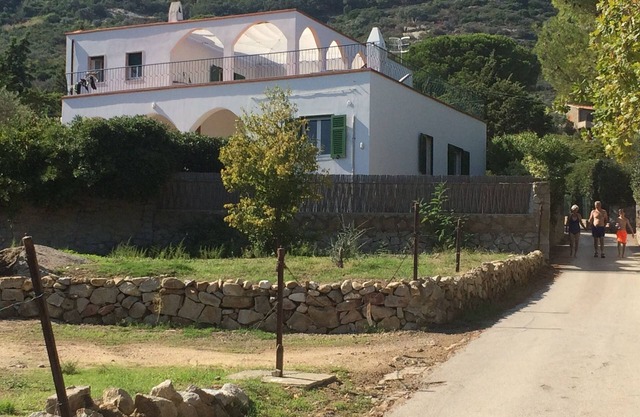 Top floor in a stunning villa on the sea with panoramic terrace and tennis court