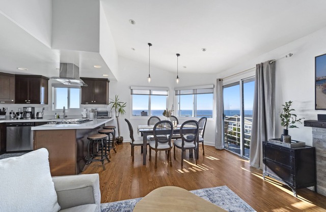 Top Floor Unit with Panoramic Views Steps to the beach with 3 Parking Spots!