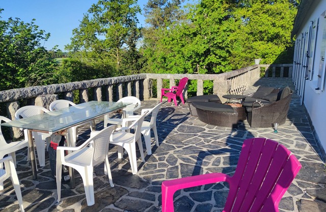 Tree oasis. Large terrace overlooking lake and forest.