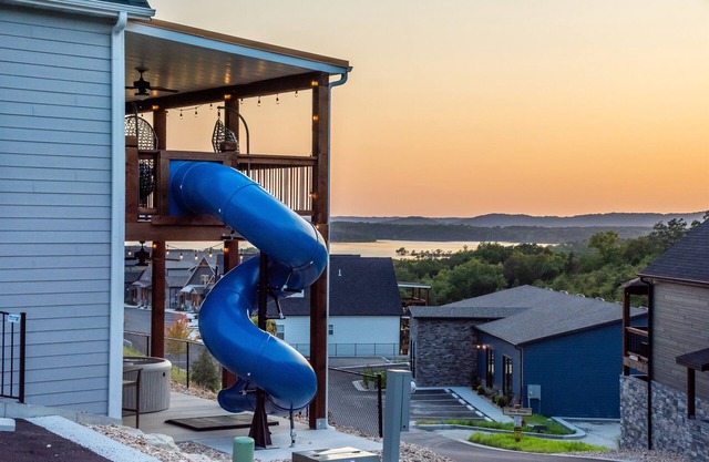 Twisty slide, Lake view, Hot tub, Indoor pool, Fire pit | Skye Retreat