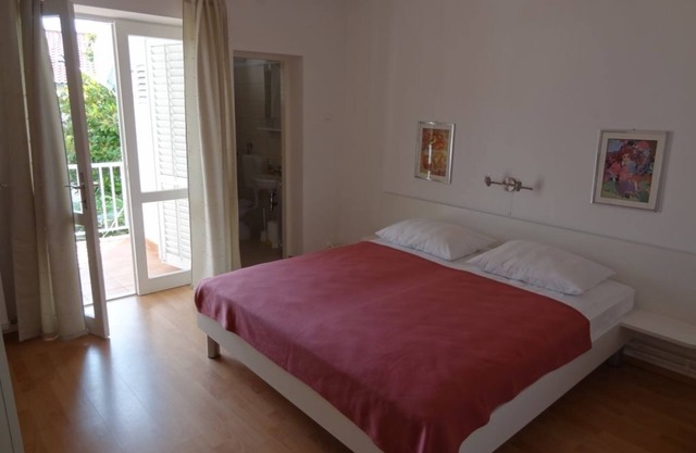 Two bedroom apartment with terrace and sea view Rab (A-16359-a)