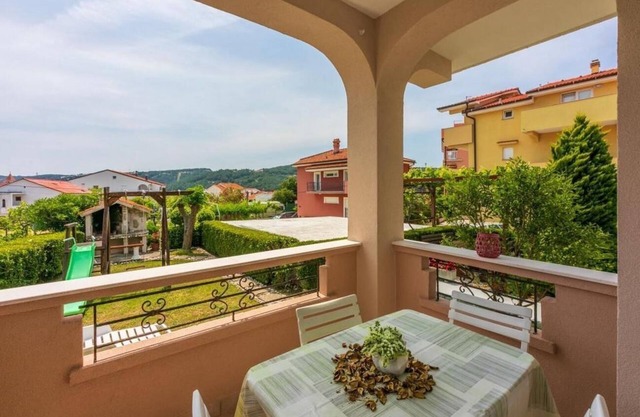 Two bedroom apartment with terrace Lopar, Rab (A-18388-a)
