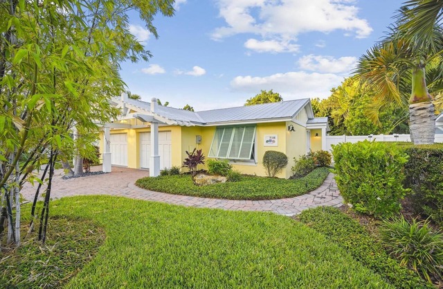 Two Bedroom Ground Floor Island Home Sleeps 5 and Includes Heated Pool.