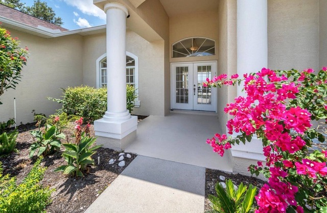 Two Master suites, Two living rooms, awesome lake view enjoy Florida sunsets!