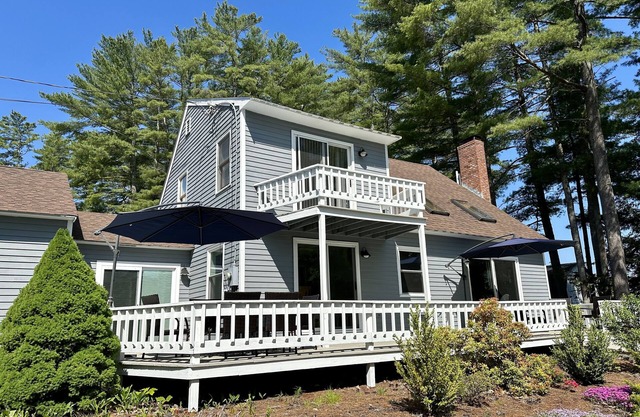 Two updated lakefront homes - dock with boat slip, game room, & screened porch
