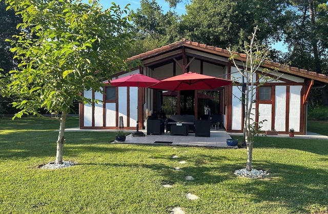 Typical Landes house near lake and forest