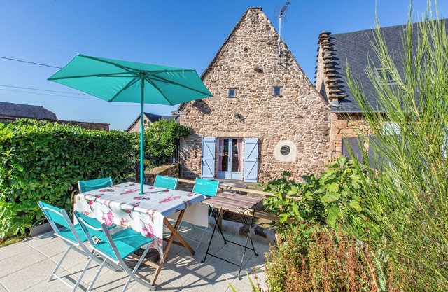Typical thatched cottage of stone within landscapes of Corrèze